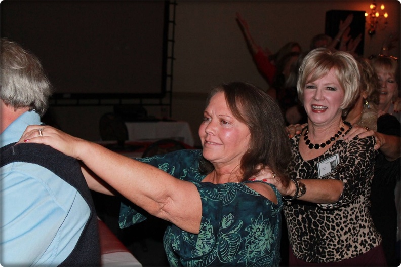 Perhaps the world's first, led by Ricky Sanders. Here are Carolyn Ogletree (Fuller) & Donna Blankenship (Barrow). This was so much easier than making all those letters with your hands 45th_66.jpg