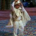 Young boy in "little sultan" outfit 
